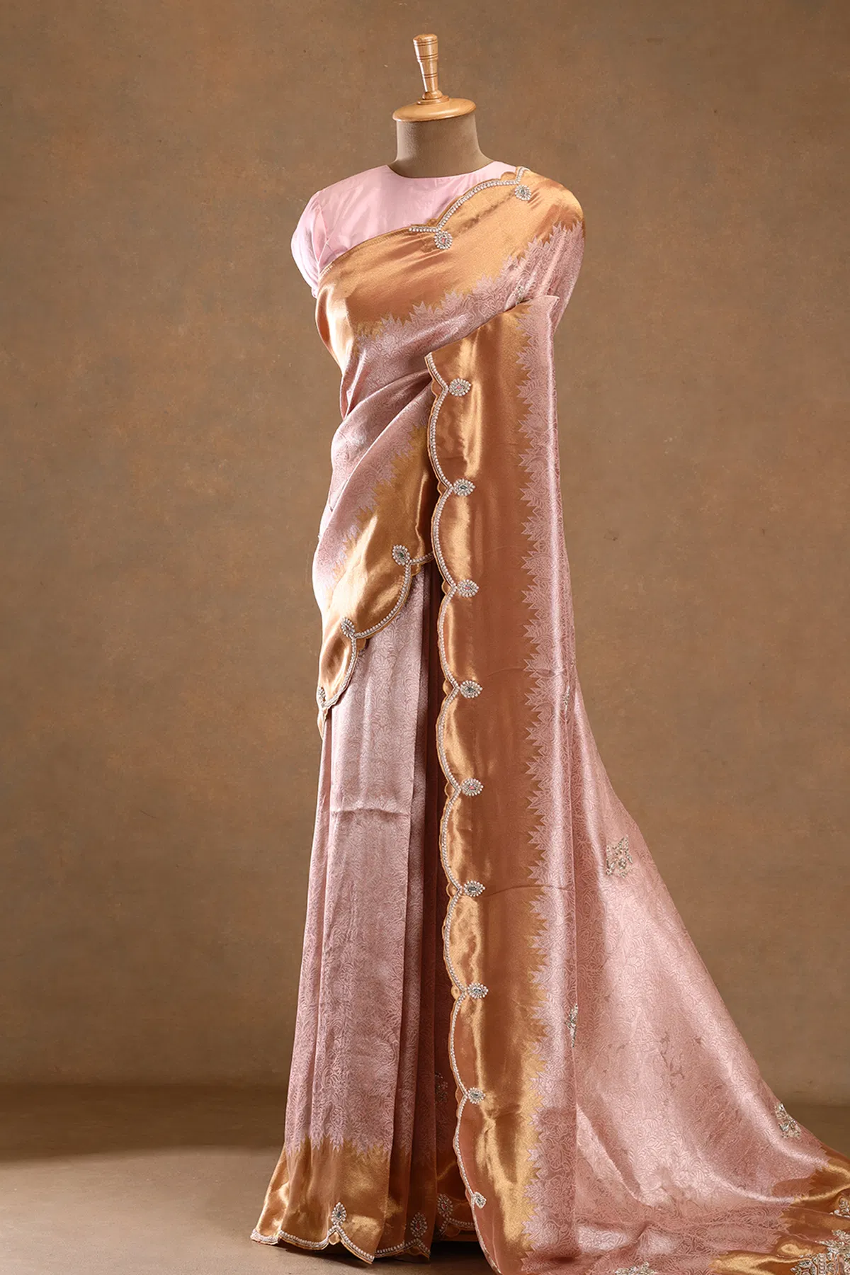 Pale pink zari woven tissue designer saree